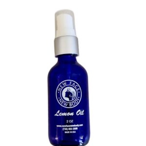 New Face New Body Pure Lemon Oil 2 oz cobalt blue glass bottle front view